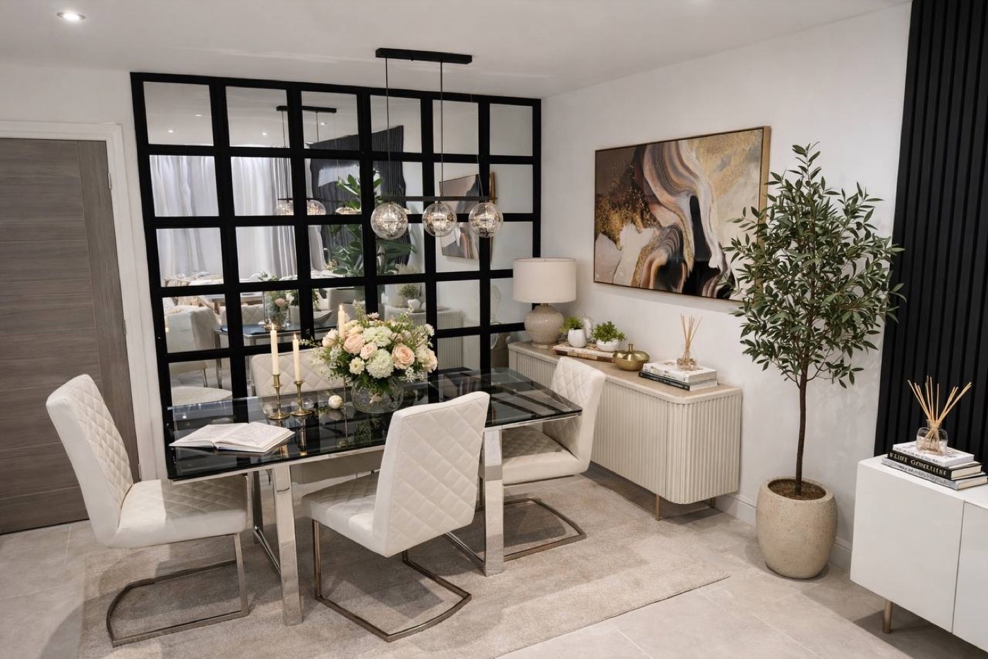 Dining room with Crittall-style mirror feature wall — bespoke interior design, Weston-super-Mare